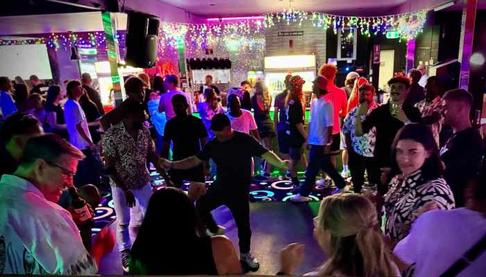 Packed party crowd at an event at Spinners Bar and Bowl Maroochydore